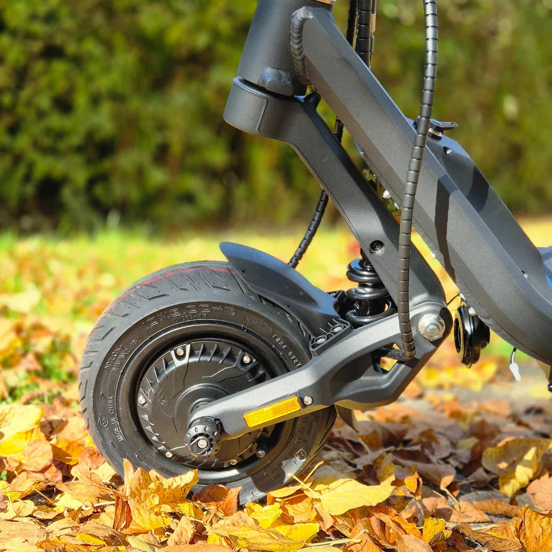 Electric Scooter Nami Klima Max features a sleek design with a robust rear wheel and suspension.
