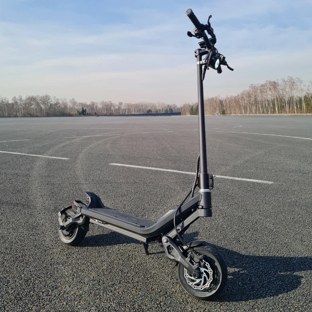 Electric Scooter Nami Klima Max, sleek design with sturdy wheels, ideal for urban commuting on smooth surfaces.