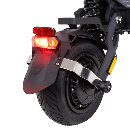 Electric Scooter Nami Klima One features a robust rear wheel with a reflective tail light, ensuring safety.