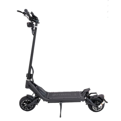 Electric Scooter Nami Klima One, sleek black design, robust frame, dual suspension, and large wheels for stability.