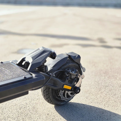 Electric Scooter Nami Stellar features a compact design with a robust rear wheel, suspension, and disc brake.