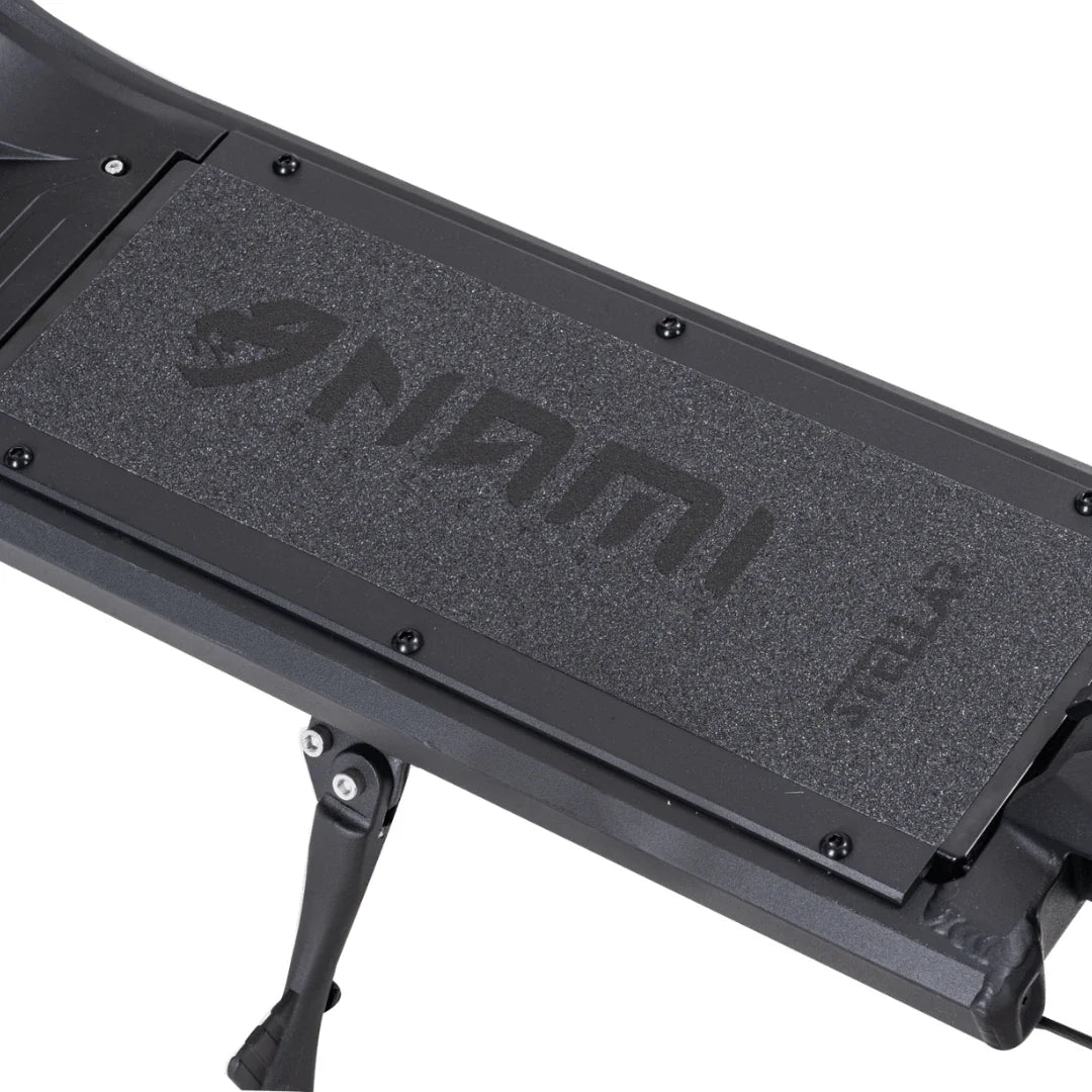 Electric Scooter Nami Superstellar features a sturdy deck with textured grip and a stylish design.