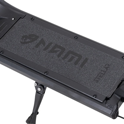 Electric Scooter Nami Superstellar features a sturdy deck with textured grip and a stylish design.