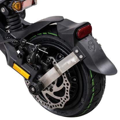 Product title: Electric Scooter Nami Superstellar. Description: Detailed view of the rear wheel with braking system and green tire accents.