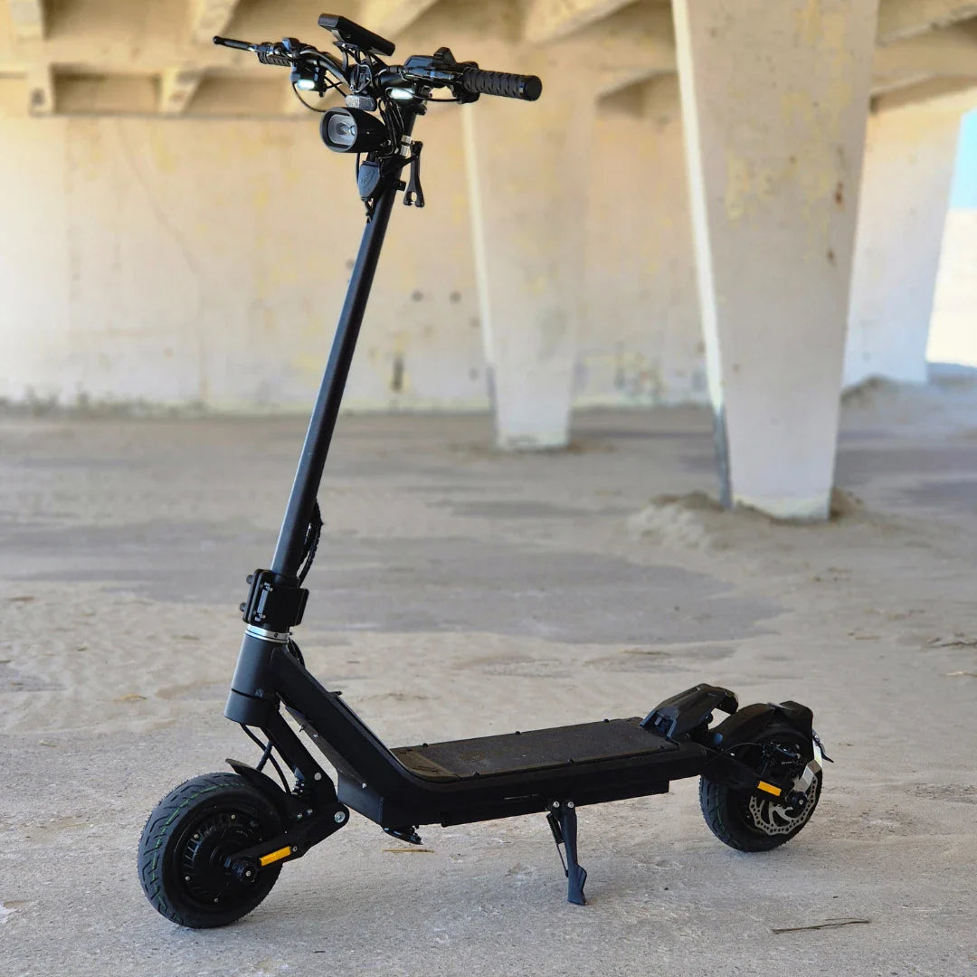 Electric Scooter Nami Superstellar features a sleek black design, robust tires, and a sturdy frame.