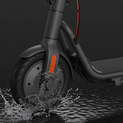 Electric Scooter Navee V40i Pro features a sleek wheel design, showcasing water splashes and robust build.