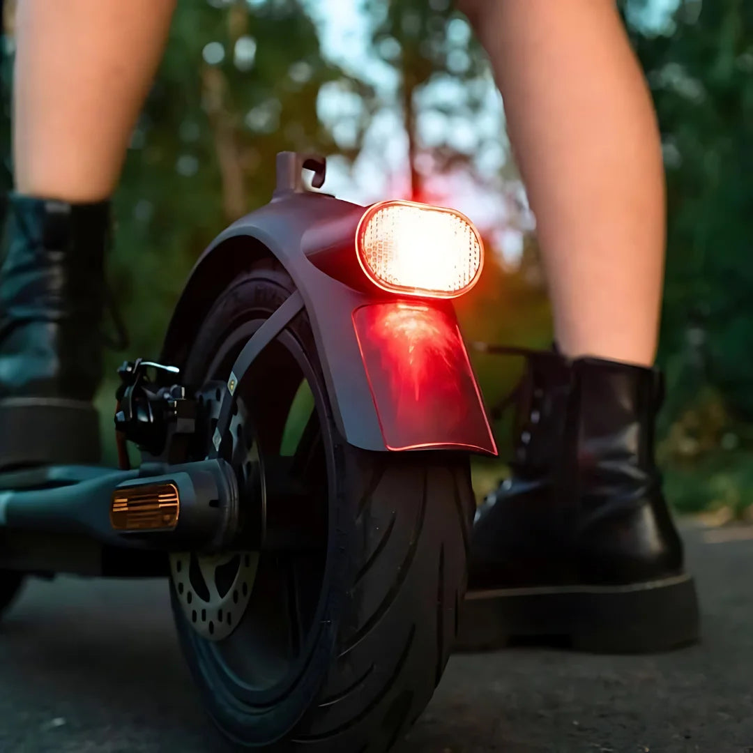 Electric Scooter Navee V50i Pro features a sleek design with a prominent rear light, perfect for safe rides.