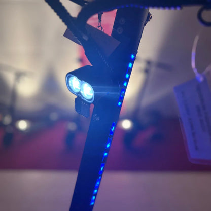 Electric Scooter Teverun Fighter Mini Pro 2025 features a sleek design with bright LED lights, stylish illumination, and a sturdy frame.