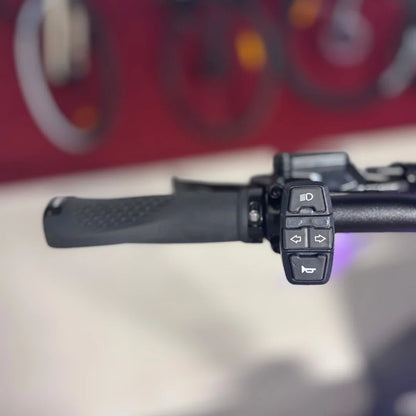Electric Scooter Teverun Fighter Mini Pro 2025 features a close-up view of its ergonomic handlebar with controls.