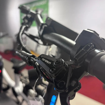 Electric Scooter Teverun Fighter Mini Pro 2025 features a sleek handlebar with advanced controls and design details.