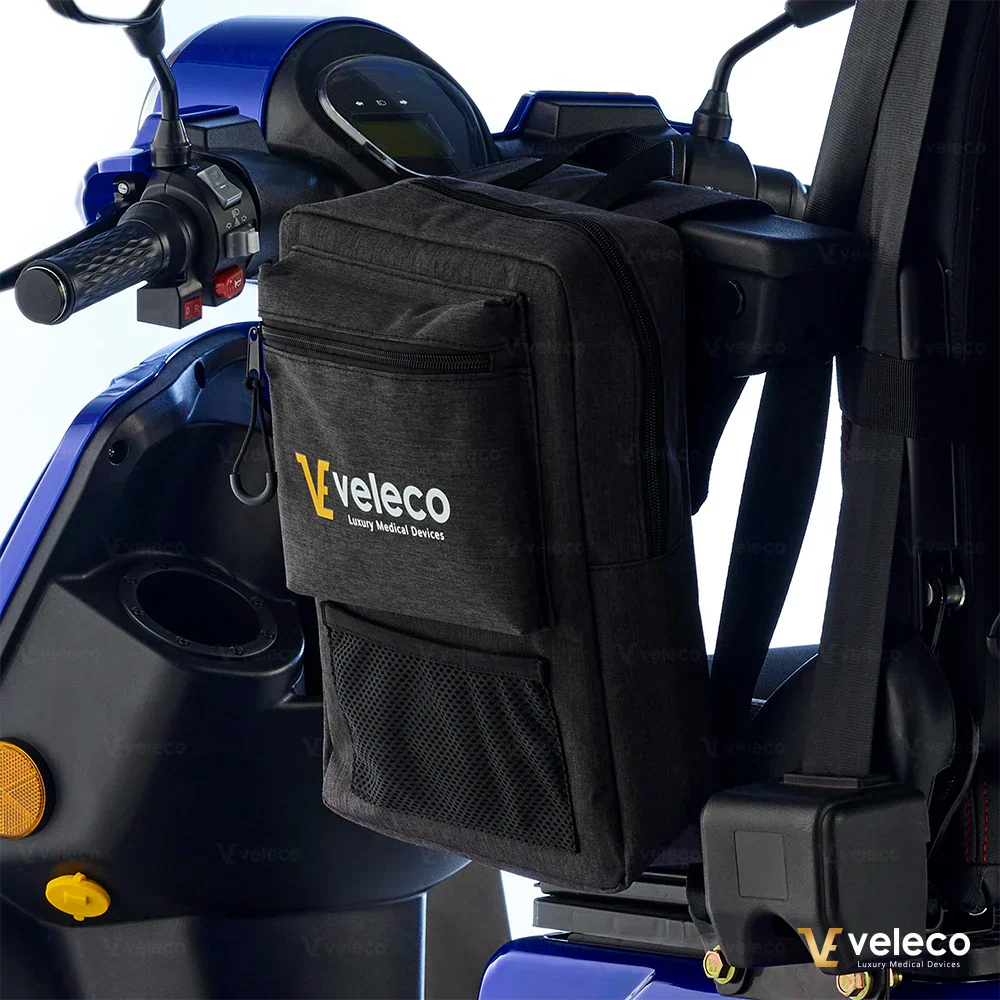 Side armrest bag for Veleco mobility scooters – bag attached to blue scooter handlebar