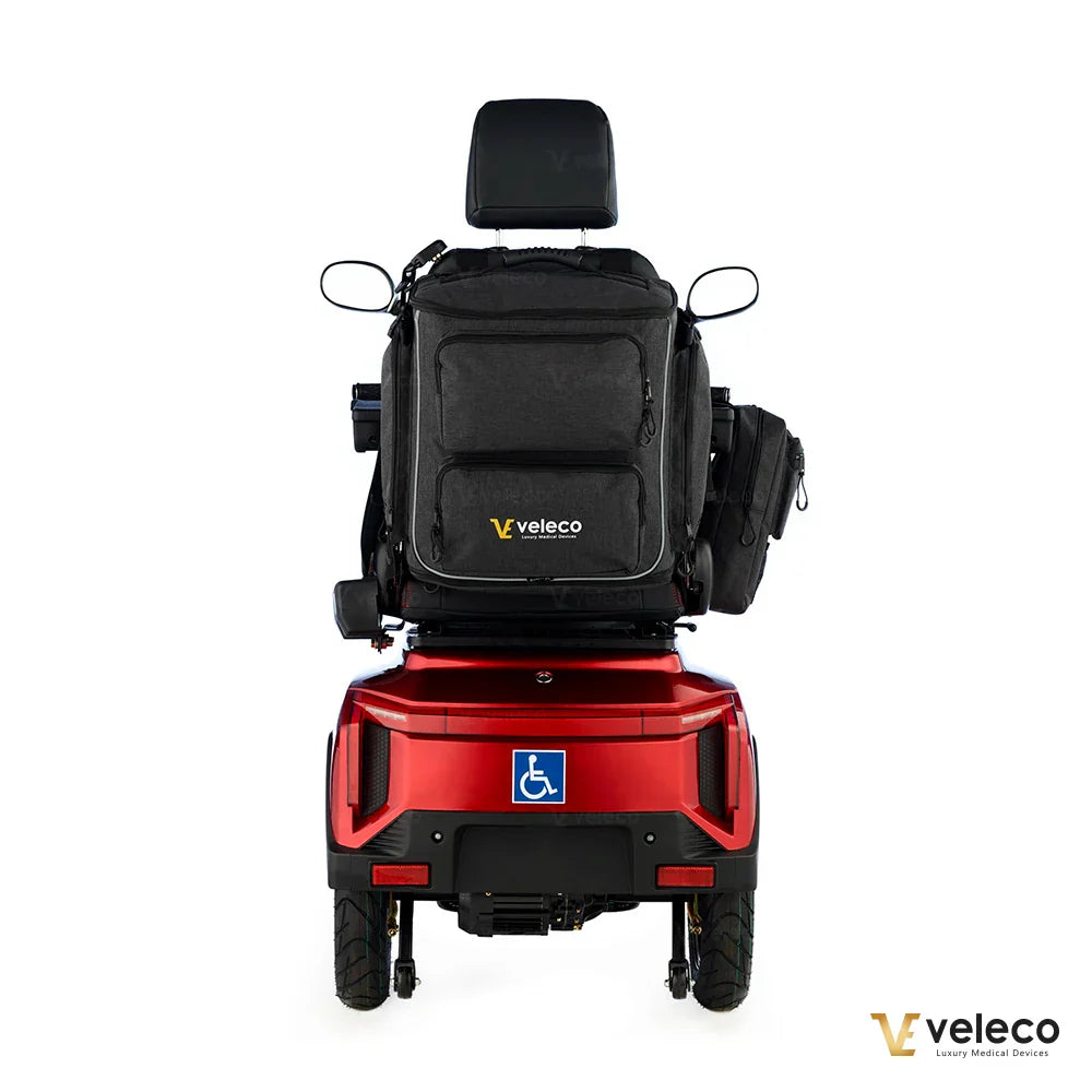 Mobility scooter and wheelchair storage bag – rear view on red scooter without crutches
