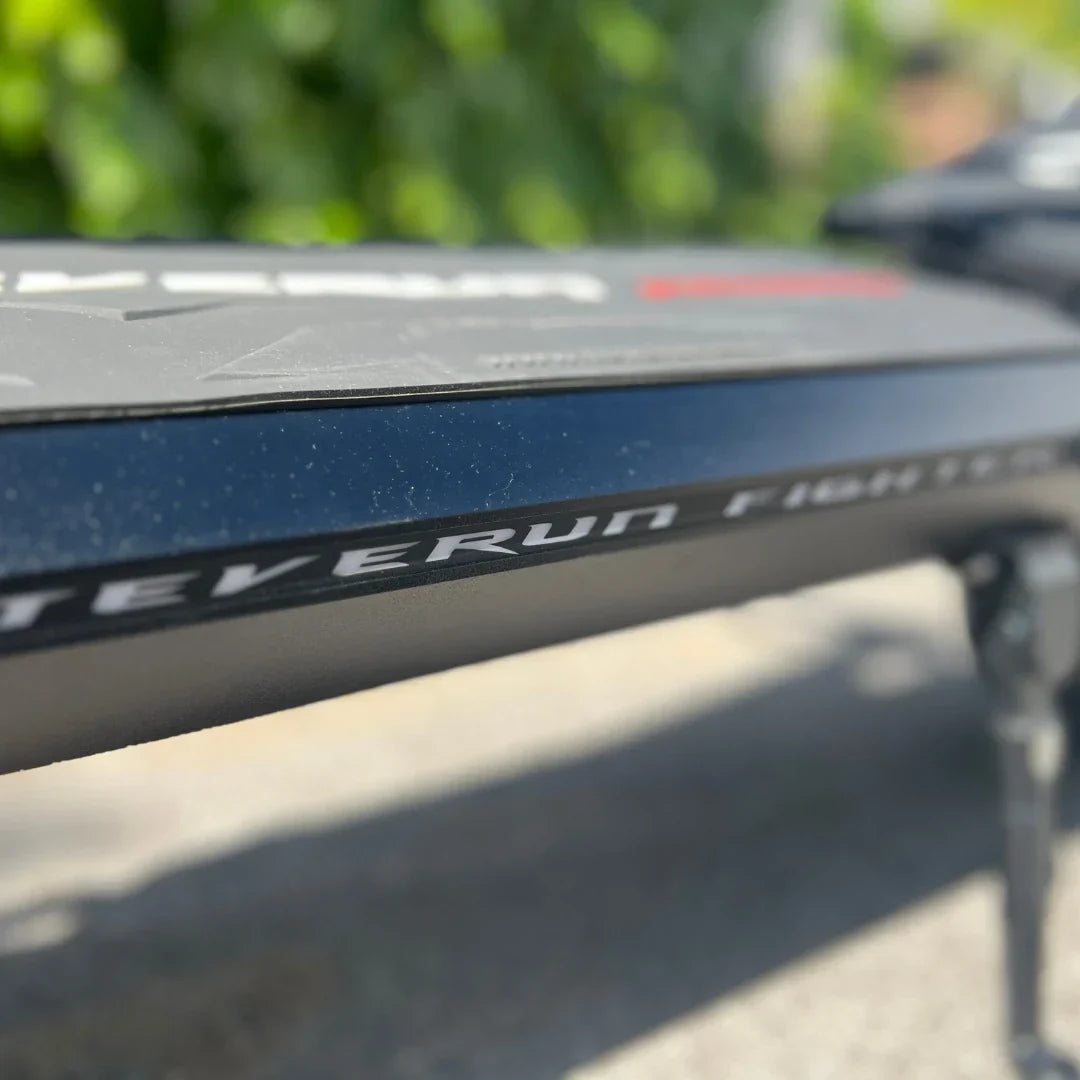 Electric Scooter Teverun Fighter 11 Plus features sleek design, showcasing a sturdy frame and logo detail.