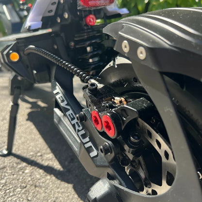 Electric Scooter Teverun Fighter 11 Plus features a close-up of its advanced braking system and sleek design.