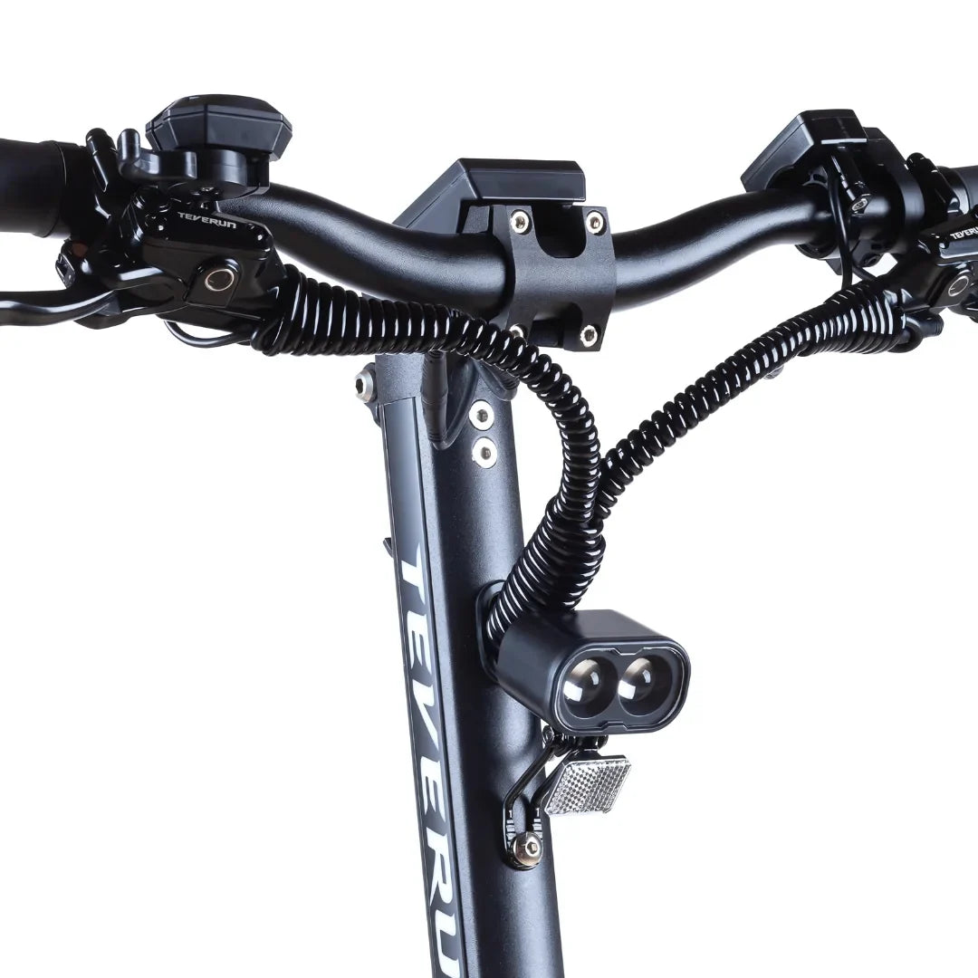 Electric Scooter Teverun Fighter Mini Pro 2025 features a sleek handlebar design, illuminated control elements, and sturdy construction.
