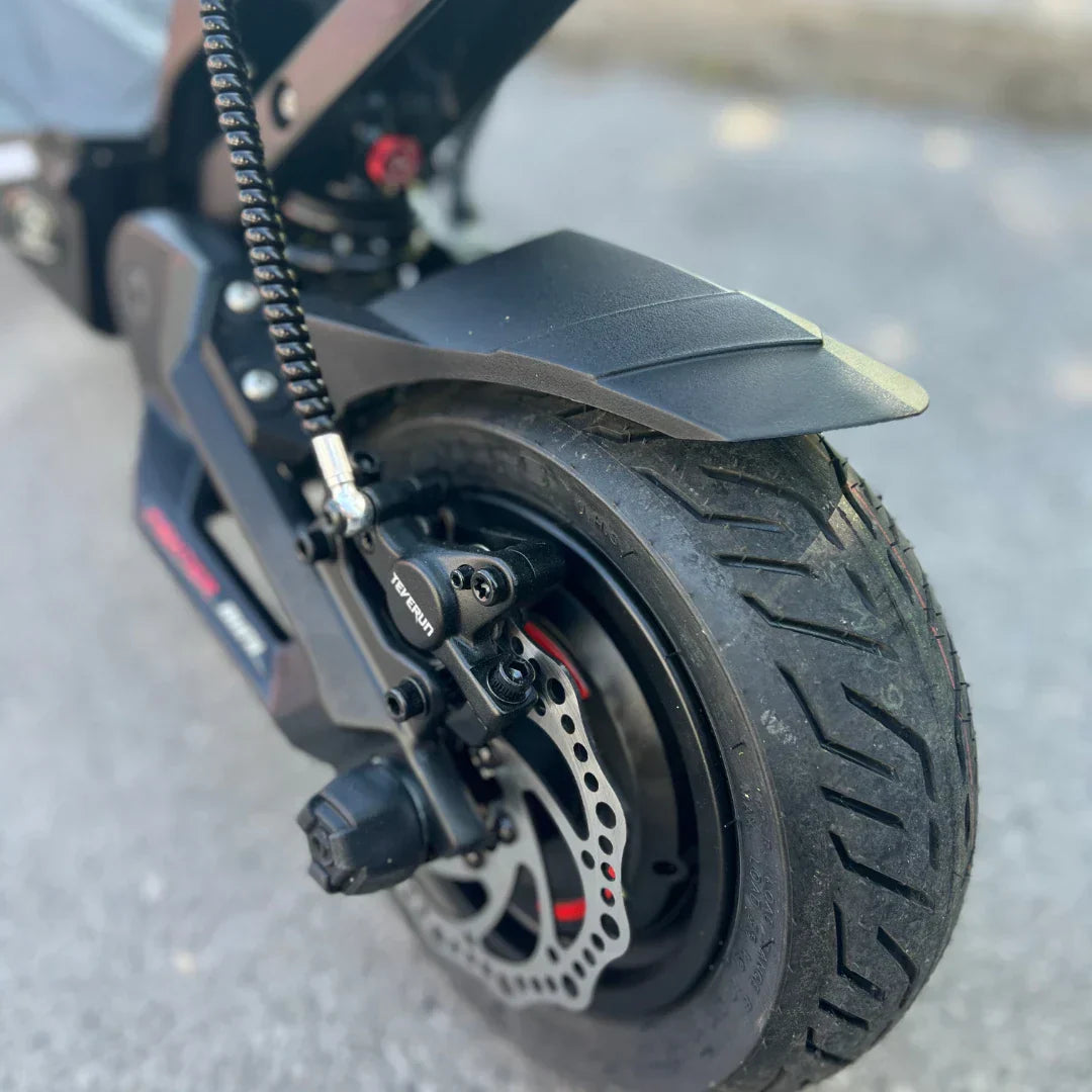 Electric scooter Teverun Fighter Mini PRO 2025 – rear wheel, disc brake, and suspension close-up