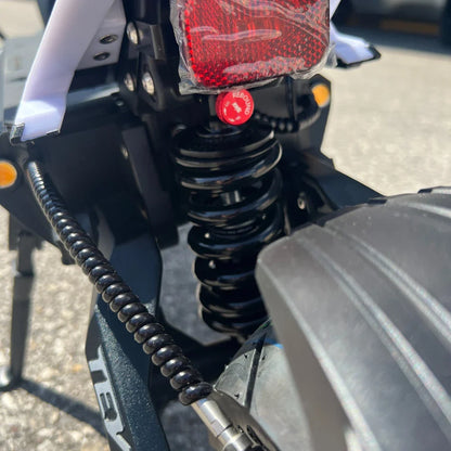 Electric Scooter Teverun Fighter Mini Pro 2025 features a durable rear shock absorber and sleek design elements.