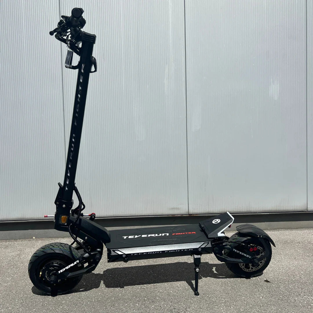 Electric Scooter Teverun Fighter Mini Pro 2025 features a sleek black design, a robust frame, and durable wheels.