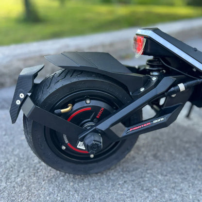Electric Scooter Teverun Fighter Mini Pro 2025 features a durable rear wheel design with a powerful motor.