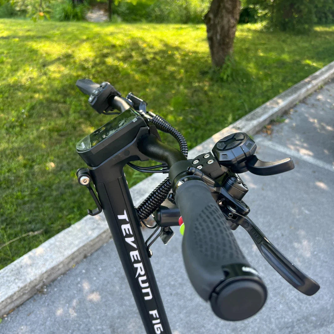 Electric Scooter Teverun Fighter Mini Pro 2025 features a sleek handlebar, digital display, and ergonomic grips.