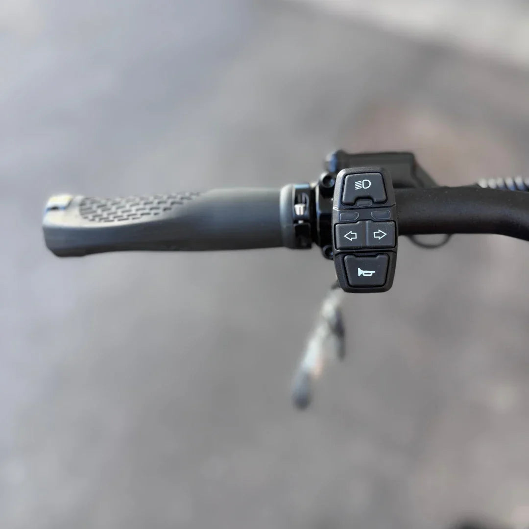 Electric Scooter Teverun Fighter Supreme 7260 Ultra features a textured grip and intuitive control buttons for easy navigation.
