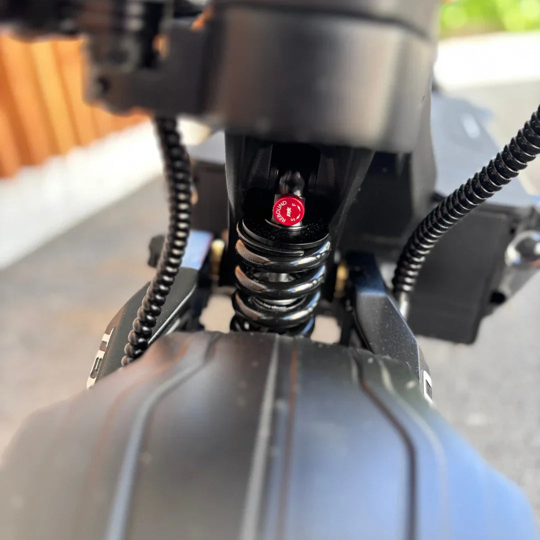 Electric Scooter Teverun Fighter Supreme 7260 Ultra features a robust suspension system with a visible spring.