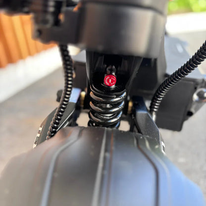 Electric Scooter Teverun Fighter Supreme 7260 Ultra features a robust suspension system with a visible spring.