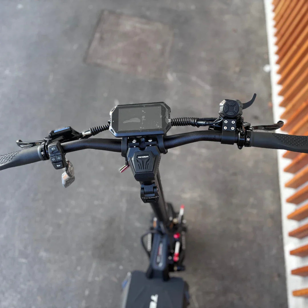 Electric Scooter Teverun Fighter Supreme 7260 Ultra features a sleek handlebar design with a digital display, controls, and grips.