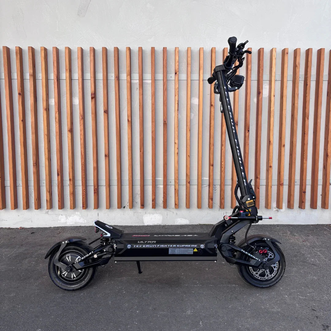 Electric Scooter Teverun Fighter Supreme 7260 Ultra features a sleek black design, sturdy construction, and robust wheels.