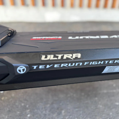Electric Scooter Teverun Fighter Supreme 7260 Ultra features a sleek black design with bold branding, ideal for urban commuting.