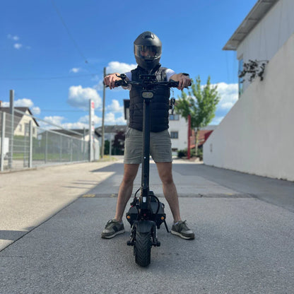Electric Scooter Teverun Fighter Supreme 7260 Ultra, sleek design with robust tires, features a rider in gear.