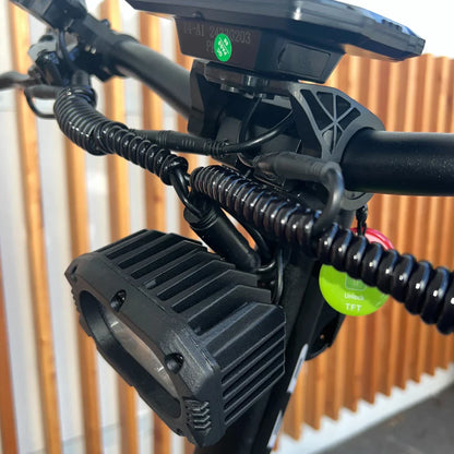 Electric Scooter Teverun Fighter Supreme 7260 Ultra features a robust design, showcasing the handlebar and lighting system.