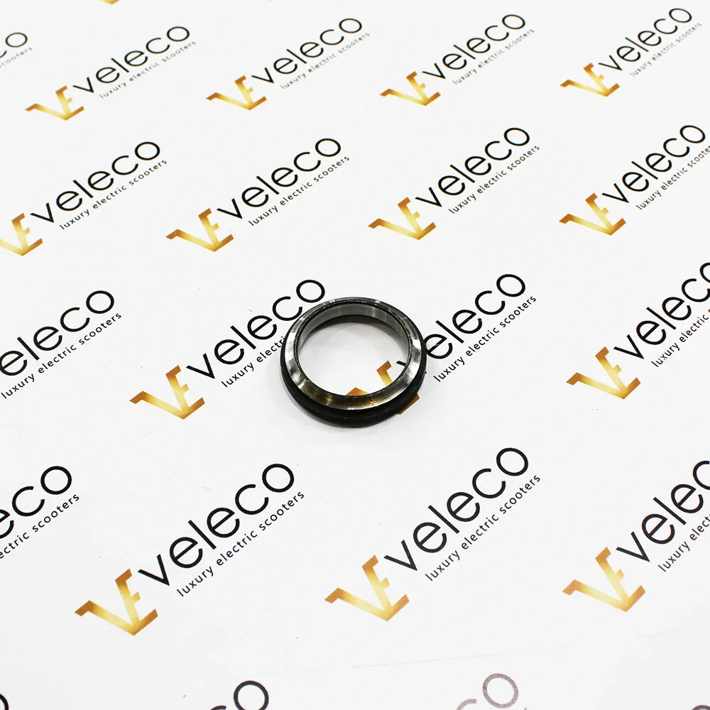 Steering Column Mounting Element Number 05 – black and silver circular metal component