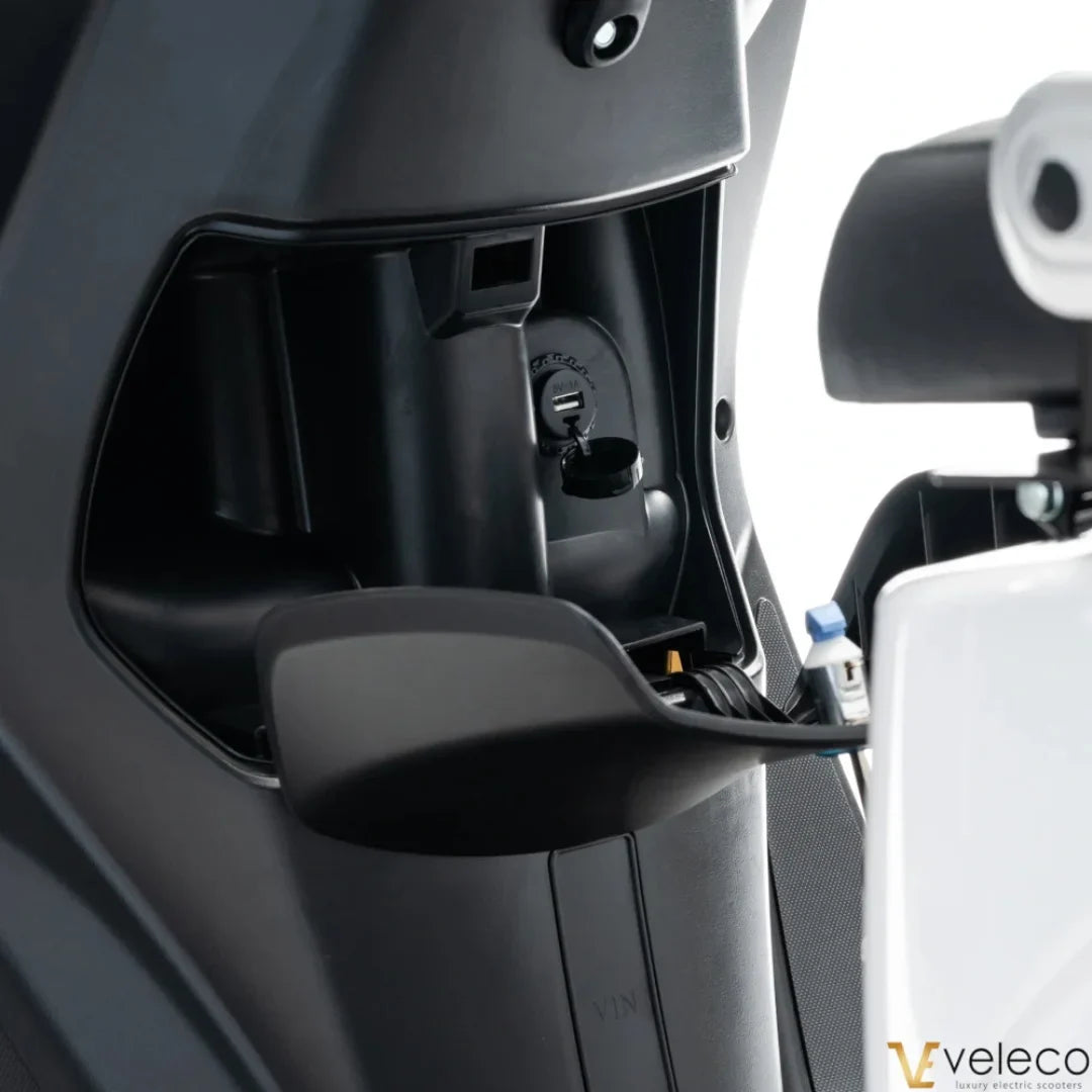 Electric Mobility Scooter Veleco Cristal features a sleek design with functional storage, ideal for convenience.