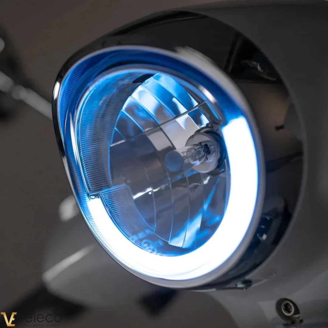 Veleco Cristal – headlight close-up with blue halo