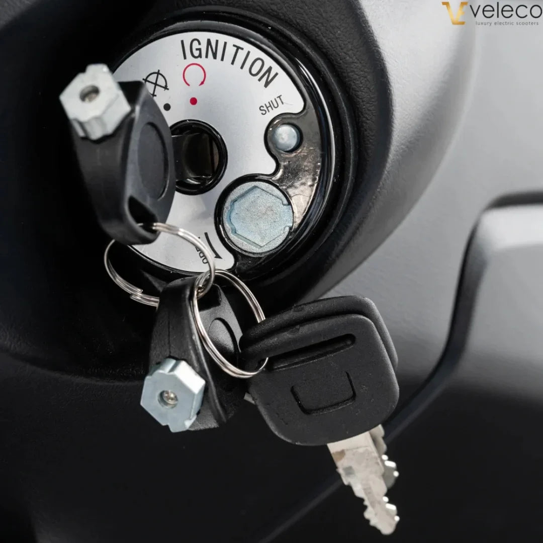 Electric Mobility Scooter Veleco Cristal features an ignition lock with keys for secure operation and ease of use.