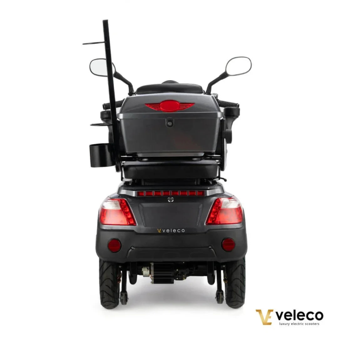 Electric Mobility Scooter Veleco Draco, features a sleek design, rear view with spacious storage, and sturdy tires.