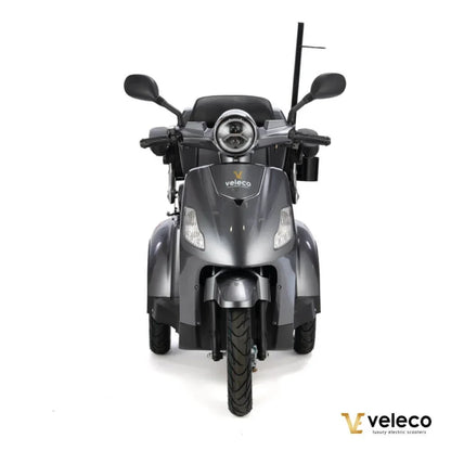 Electric Mobility Scooter Veleco Draco features a sleek gray design, comfortable seat, and powerful headlights.