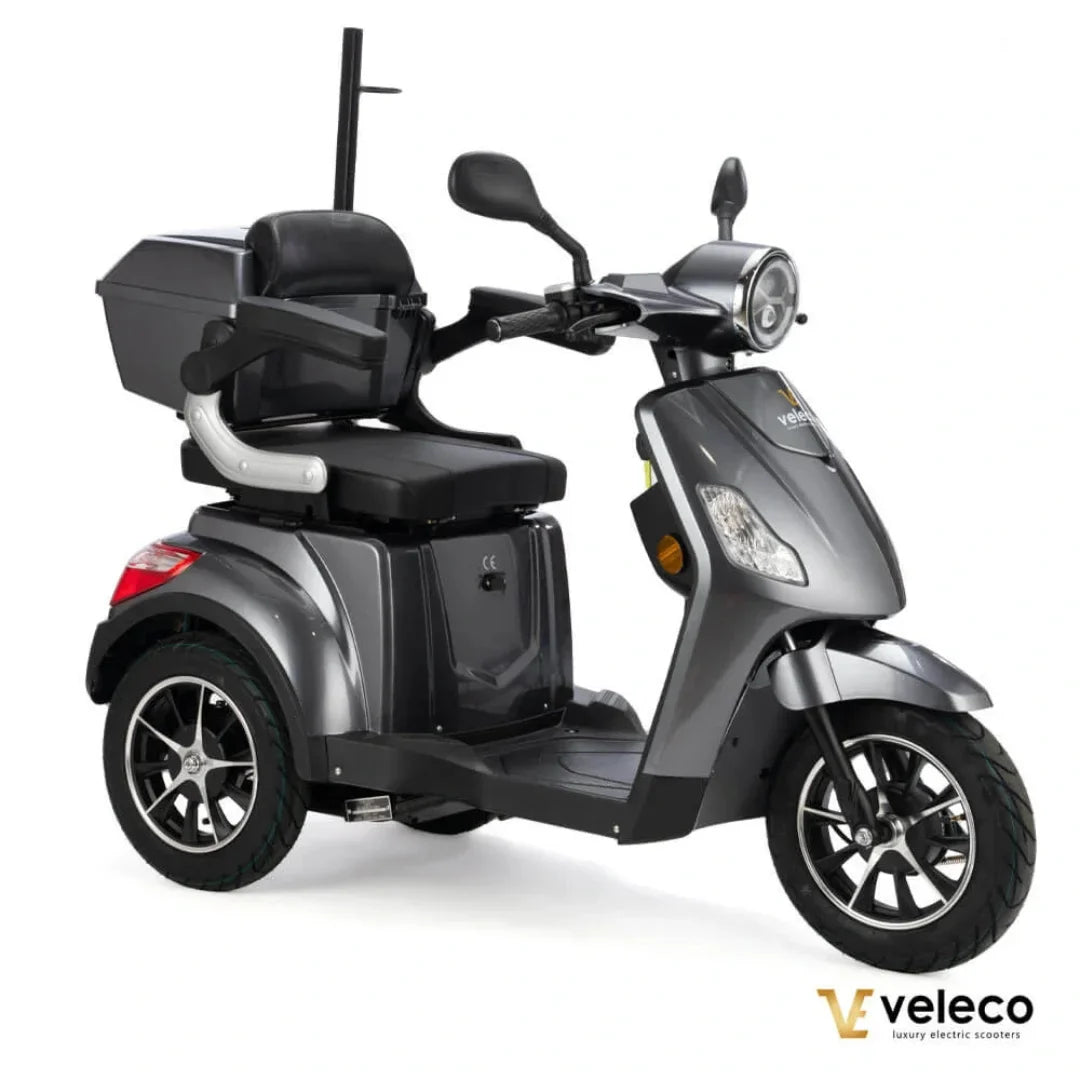 Electric Mobility Scooter Veleco Draco features a sleek grey design, comfortable seating, and ample storage.