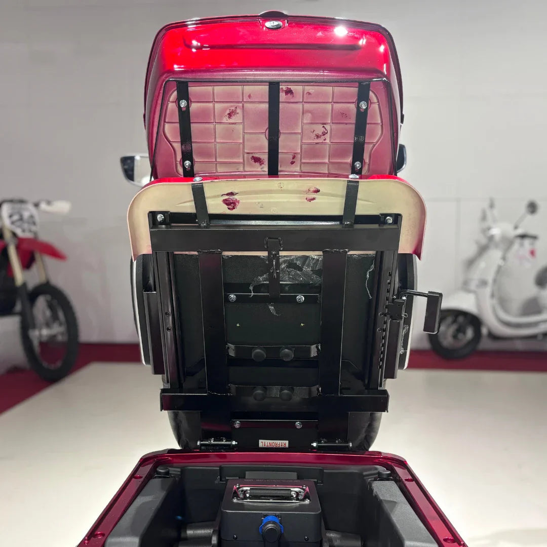Vigorous VISTA 1 – seat lifted, battery compartment visible
