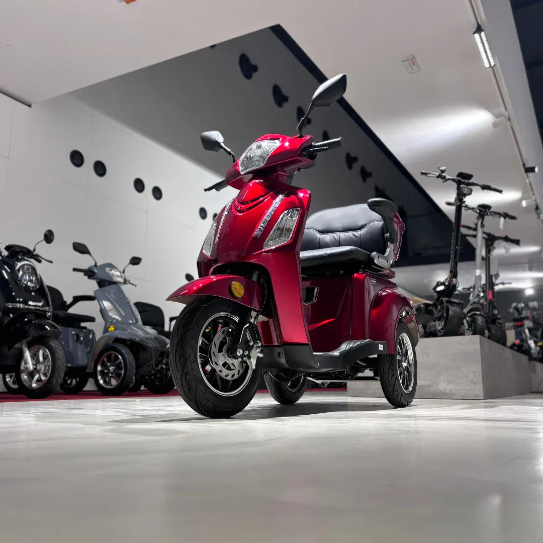 Vigorous VISTA 1 – red colour variant in showroom, angled front view