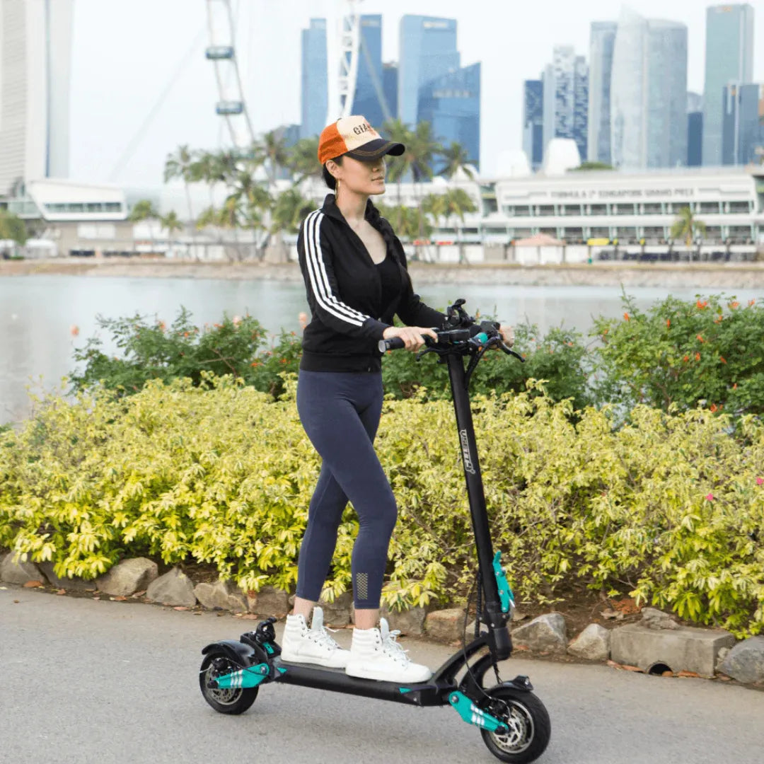 Electric scooter VSETT 9+ – woman riding, outdoor setting