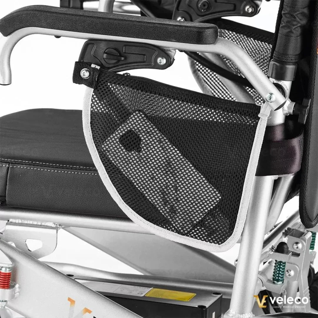 Electric Wheelchair Veleco Cosmo features a sleek design with a side mesh pocket for convenient storage.