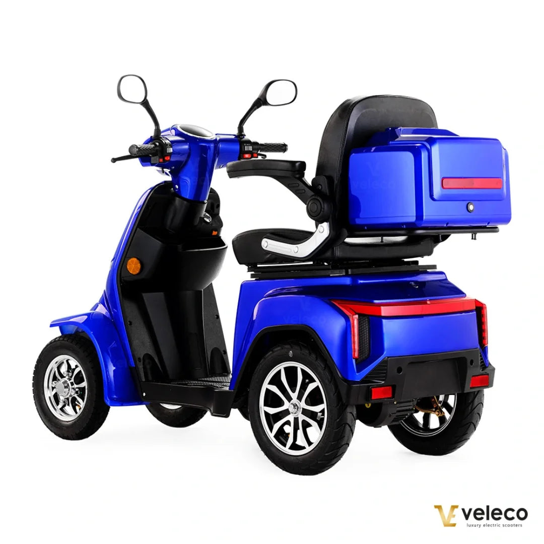 Electric Mobility Scooter Veleco Gravis, vibrant blue design, comfortable seating, ideal for safe transport on various terrains.
