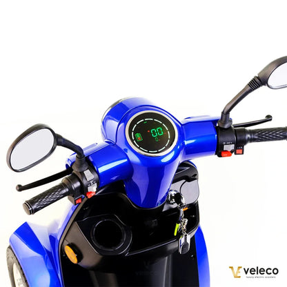 Electric Mobility Scooter Veleco Gravis features a sleek blue design, digital display, and ergonomic handlebars.