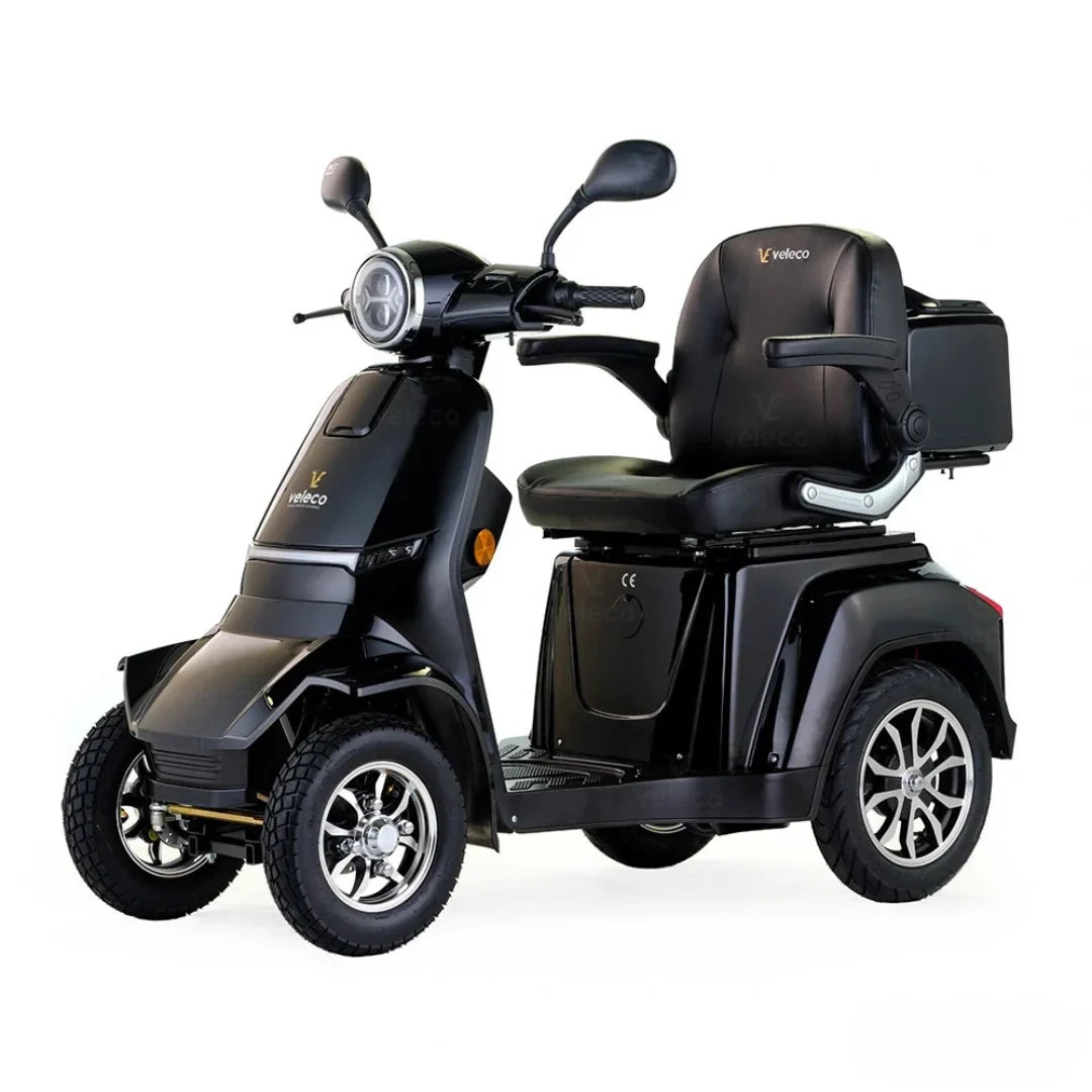 Electric Mobility Scooter Veleco Gravis, featuring a stylish black design, comfortable seating, and sturdy wheels.