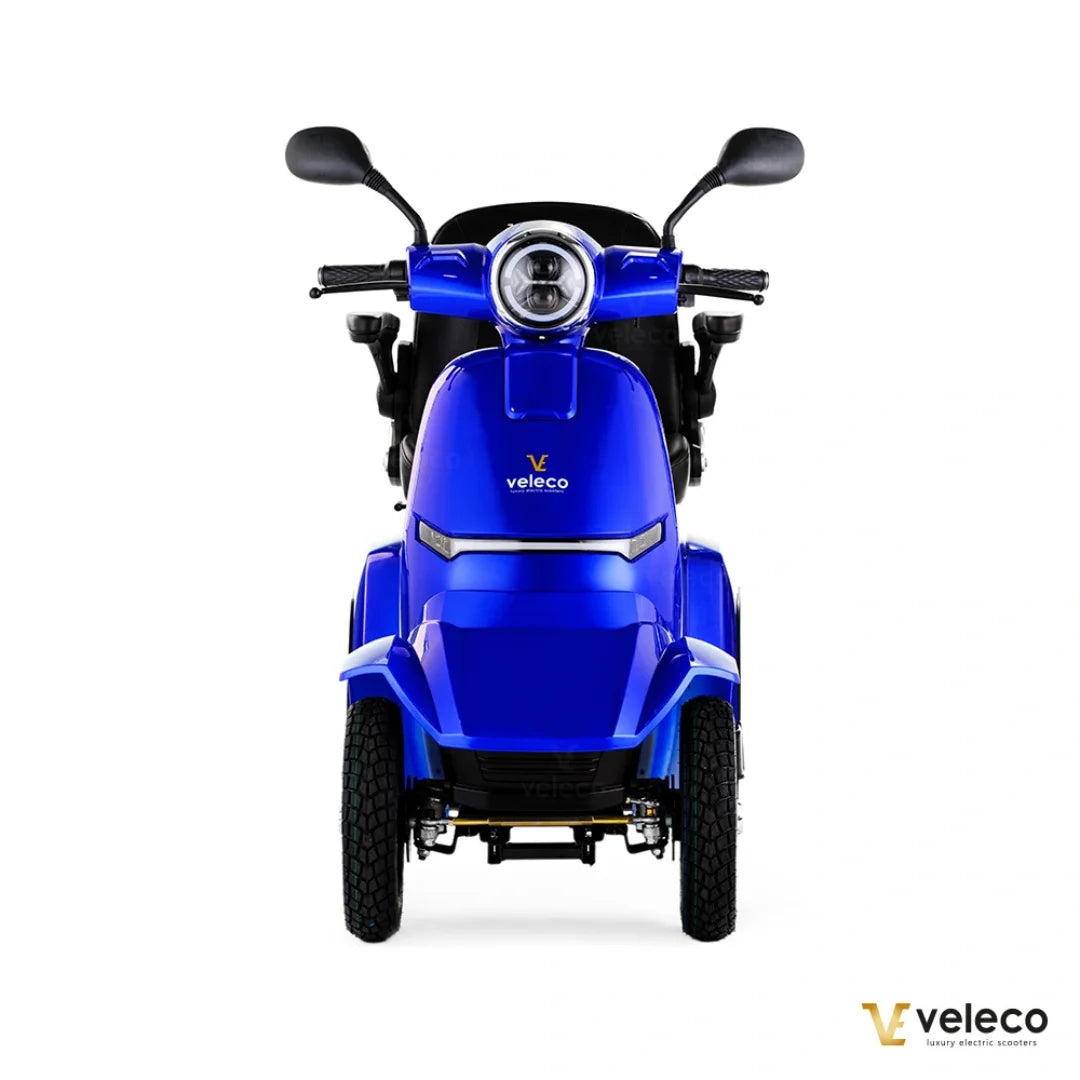 Electric Mobility Scooter Veleco Gravis features a sleek blue design, comfortable seating, and sturdy handlebars.