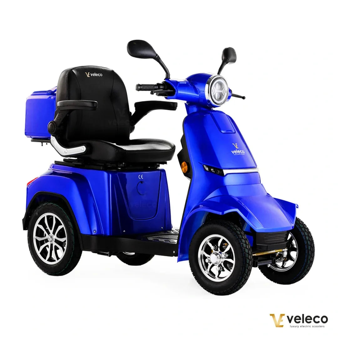 Electric Mobility Scooter Veleco Gravis features a vibrant blue design, comfortable seat, and sturdy wheels.