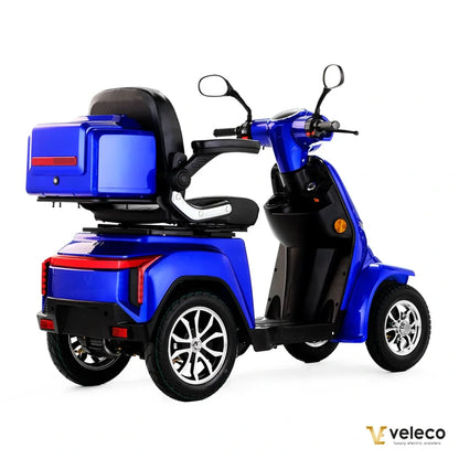 Electric Mobility Scooter Veleco Gravis, sleek blue design, rear storage box, comfortable seat, great for mobility.