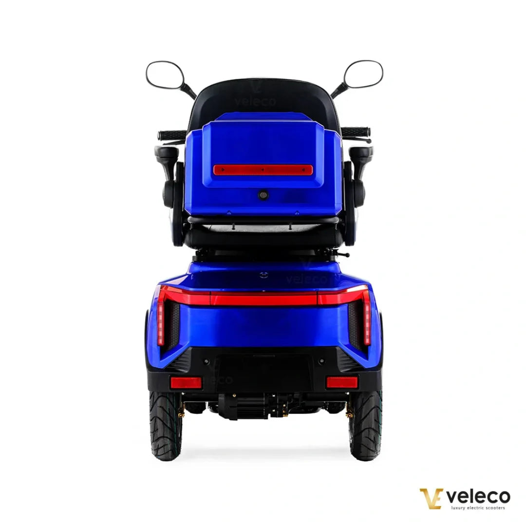 Electric Mobility Scooter Veleco Gravis, a stylish blue scooter with a comfortable seat and rear mirrors.